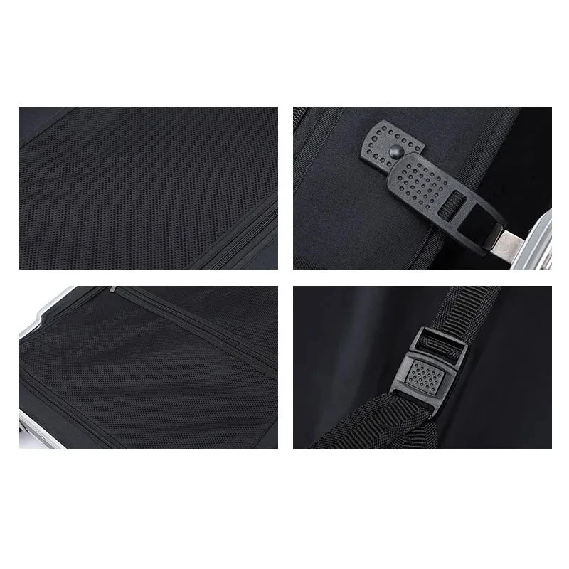 Close-up details of a black bag with zippers and straps on a white background
