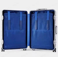 Open blue suitcase with blue interior on a white background