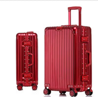 Two red suitcases with wheels on a white background