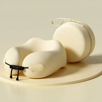 Beige travel neck pillow with carrying case on a beige background