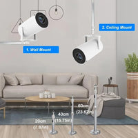 Two security cameras on wall and ceiling with measurements in a living room setting.
