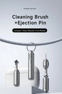 Portable keychain cleaning brush and ejection pin set on a light gray background