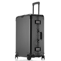 Black suitcase with handle and wheels on a white background