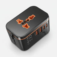 Black and orange travel adapter on a white background