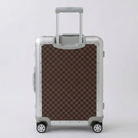 Rear view of Aeria Prestige The Monarch aluminum travel case in Damier brown checkered finish, displaying the retractable handle and smooth-rolling spinner wheels.