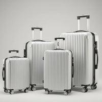 Aeria Prestige The Vantage 3-piece silver hardside luggage set, sizes 20, 24, and 28 inch.