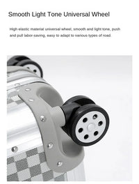 Close-up of the high-elasticity silent-motion spinner wheel with shock-absorbing TPE treads on the Monarch aluminum luggage.