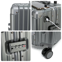Close-up composite views of The Aero-PC Vanguard — Carbon-Texture Frame Case in Astral Grey, focusing on its premium construction. The image details the riveted corner reinforcements, the integrated USB fast-charge power gateway, the secure dual-latch TSA-approved lock, and the durable multi-directional spinner wheel system.