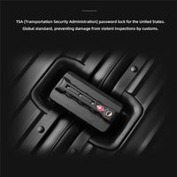Close-up of the integrated TSA-approved combination lock on The Masterpiece — The Legacy Aluminum Luggage by AERIA PRESTIGE. This high-security, vault-grade locking mechanism is embedded into the aluminum-magnesium alloy frame, ensuring secure travel and damage-free inspections.