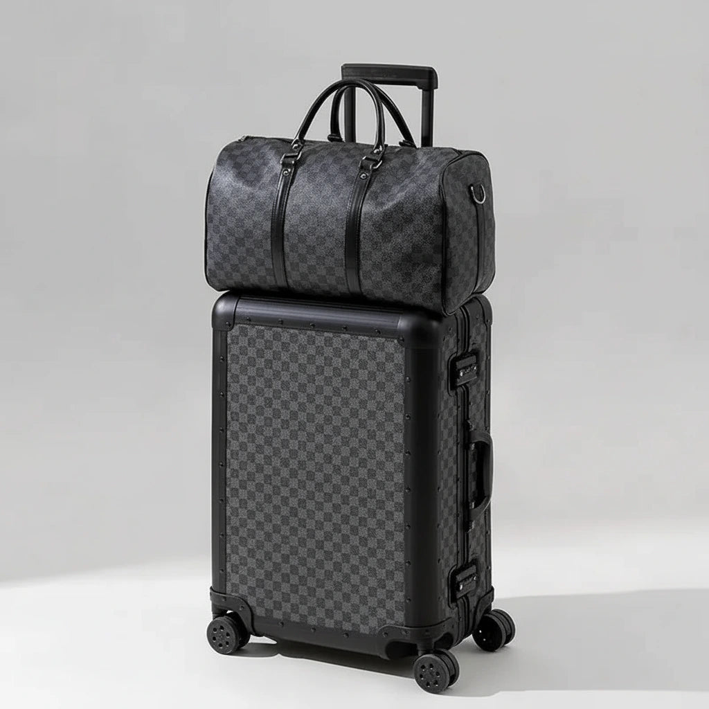 Black checkered suitcase with a matching duffel bag on a beige background
