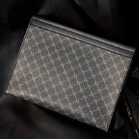 Patterned pouch on a dark background