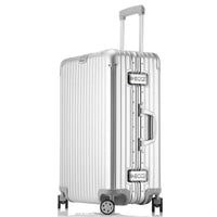 Silver suitcase with a visible brand logo on a white background