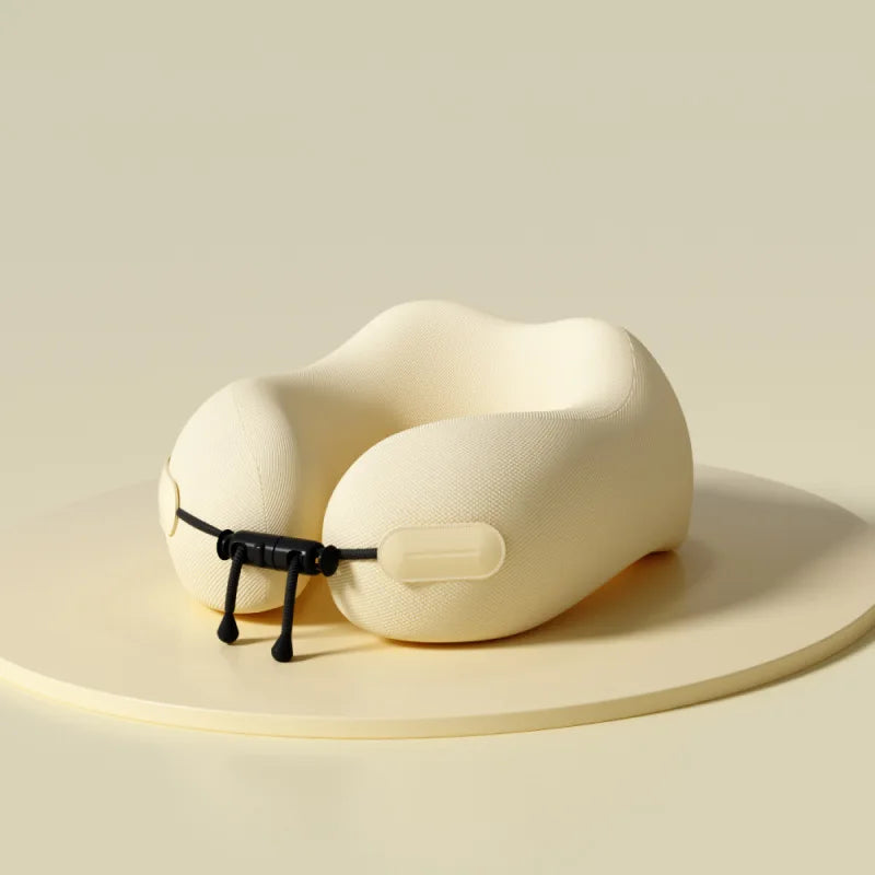 Beige travel neck pillow on a beige background