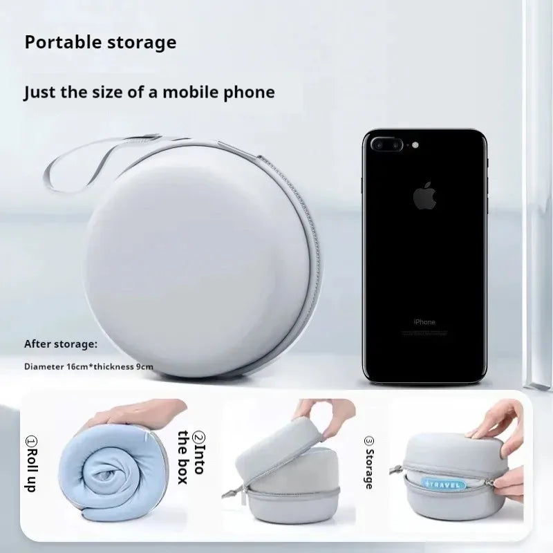 Portable storage device shown next to a smartphone, demonstrating its compact size.