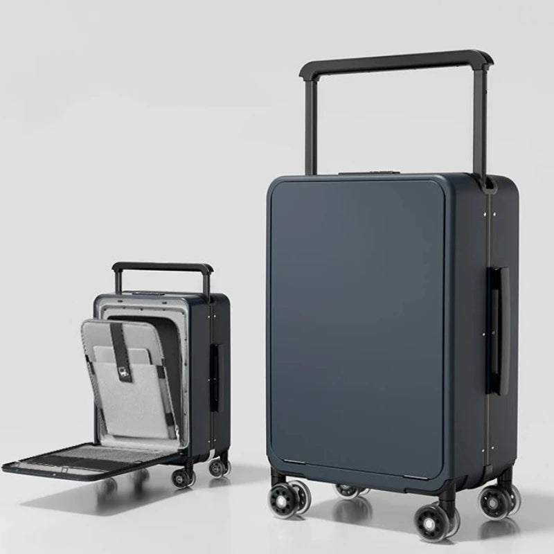 Two dark gray suitcases on a light gray background