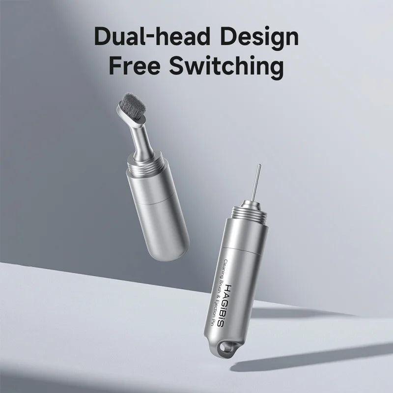 Two metallic tools with dual-head design and free switching feature on a gray background