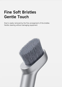 Cleaning brush with soft bristles on a white background