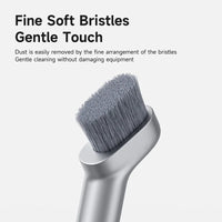 Cleaning brush with fine soft bristles on a white background