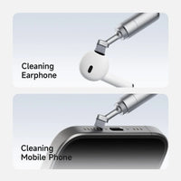 Cleaning tool being used on a white earphone and smartphone.
