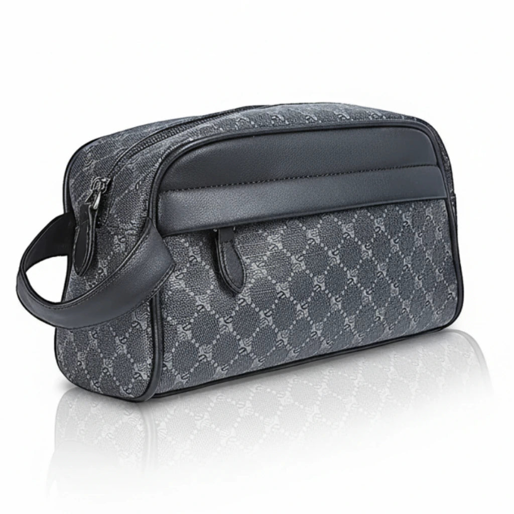 Gray patterned toiletry bag with black handle on a white background