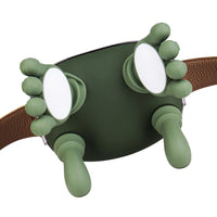 Green dog muzzle with brown strap on a white background