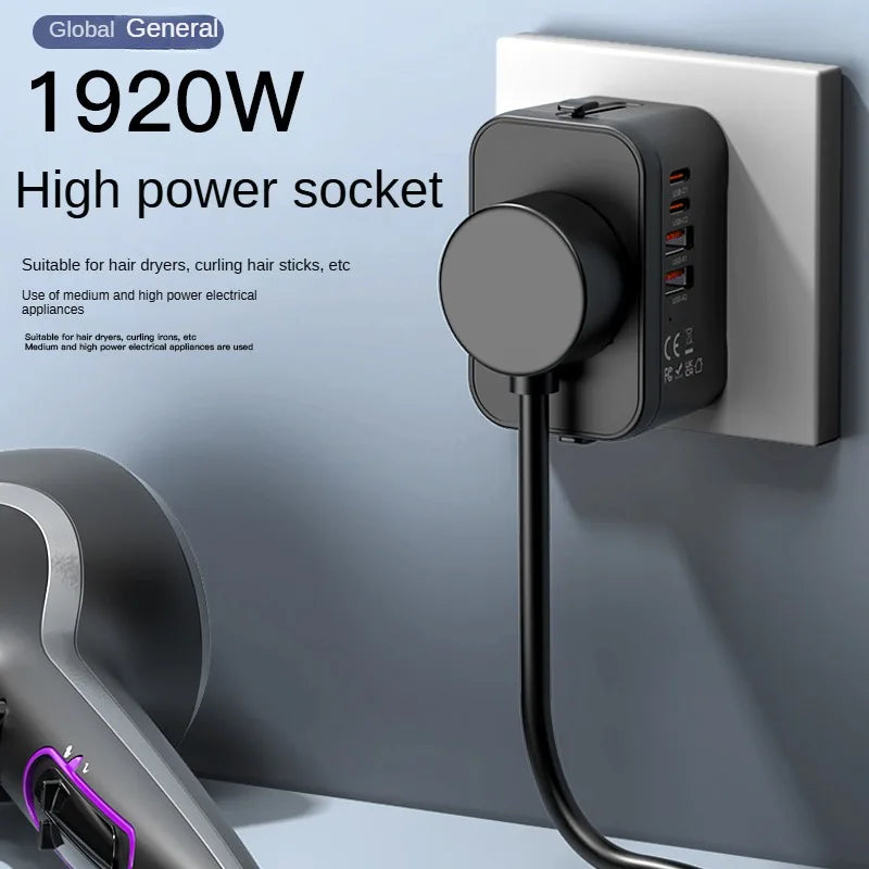 High power socket with multiple outlets and USB ports on a gray wall.