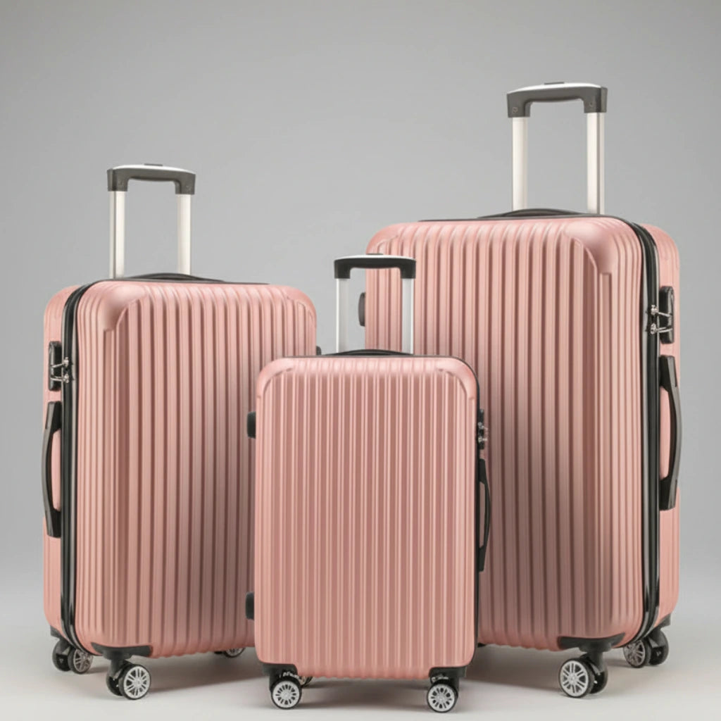 Aeria Prestige The Vantage 3-piece champagne hardshell spinner luggage set with extended telescoping handles, sizes 20, 24, and 28 inch.