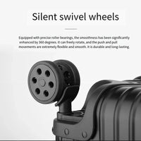 Close-up shot of the premium double silent swivel wheels with precise roller bearings on The Masterpiece — The Legacy Aluminum Luggage. The grayscale image showcases the high-end engineering and durable hardshell chassis of the AERIA PRESTIGE collection.